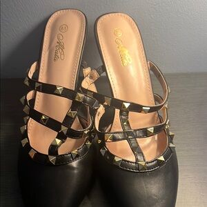 Hot Kiss Black and Gold Mules with Elegant Design